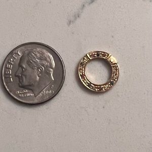 14k yellow gold with multicolored gemstones, charm holder/ clasp. Barely used.